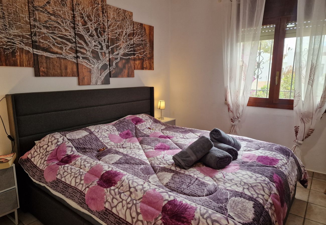 Bedroom-with-air-conditioning-and-king-size-bed-House-Noella.jpg